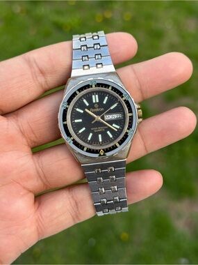 Armitron rare vintage Silver with black day date men’s watch